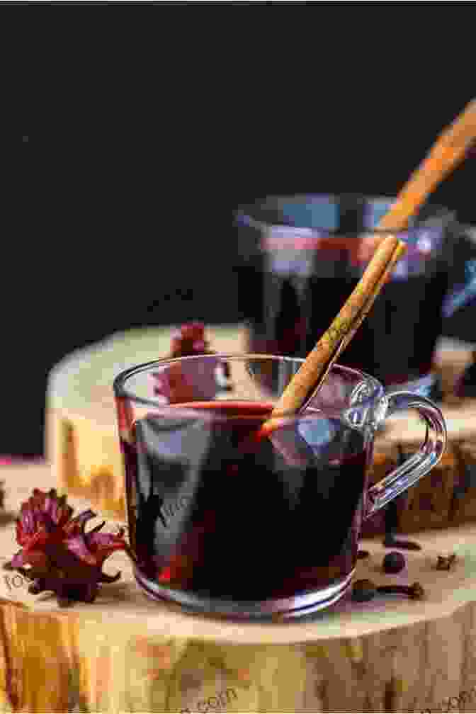 A Glass Of Vibrant Sorrel Drink, Garnished With A Cinnamon Stick Jamaican Christmas Recipes: 21 Most Wanted Jamaican Christmas Recipes (Christmas Recipes Book)