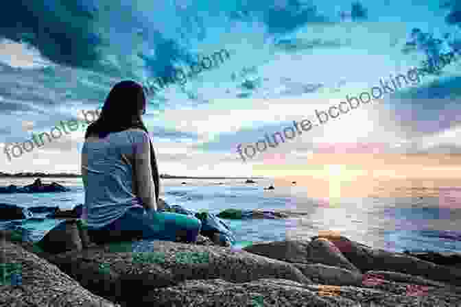 A Young Woman Sitting On A Rock, Looking Out At The Ocean. Going Home: Quick Reads L S Barnes