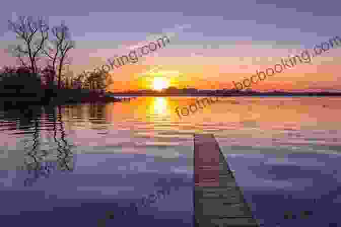 An Image Of A Vibrant Sunrise Over A Tranquil Lake, Nature's Beauty Captured In Its Splendor A Beautiful Question: Finding Nature S Deep Design
