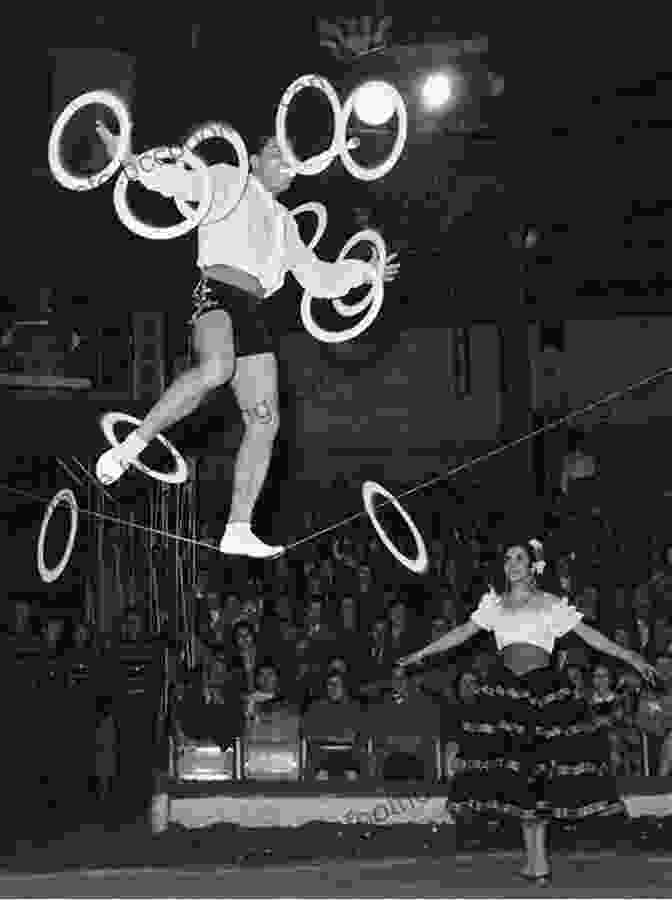 Circus Performer Juggling On A Tightrope The Lives Of A Showman