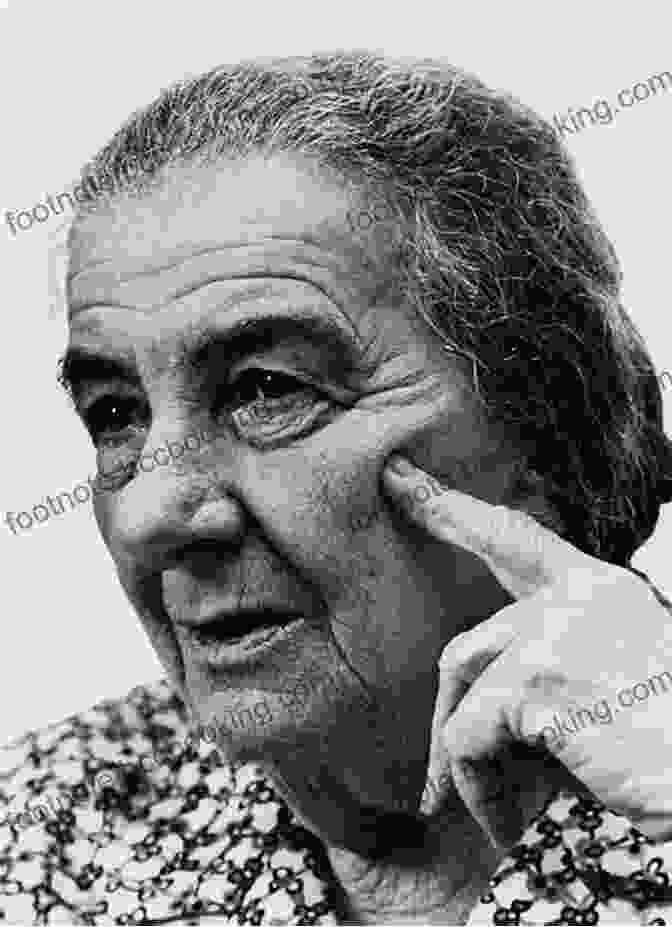Golda Meir, Former Prime Minister Of Israel, Stands In Front Of A Map Of The Middle East With A Determined Expression Lioness: Golda Meir And The Nation Of Israel