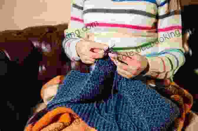 Image Of A Person's Hands Knitting The Kp546 Bonnet, Emphasizing The Intricate And Precise Nature Of The Knitting Process. Knitting Pattern KP546 Small Tiny Preemie Newborn 0 3mths Baby Bonnet USA Terminology