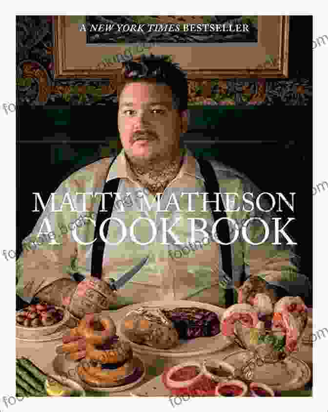 Matty Matheson Holding A Copy Of His Cookbook Matty Matheson: A Cookbook Matty Matheson