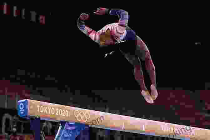 Simone Biles Performing A Backflip On The Balance Beam Simone Biles: Gymnastics Star (Women Sports Stars)