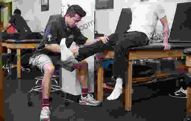 Students Engaged In Practical Athletic Training Techniques. Management Strategies In Athletic Training (Athletic Training Education)